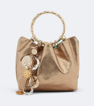 Aquazzura Bolso saco Night Stars de piel metalizada