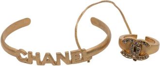 Chanel 2001 Gold Plated CC Rhinestone and Logo Cuff Bracelet and Ring Set costume bracelet - Goud