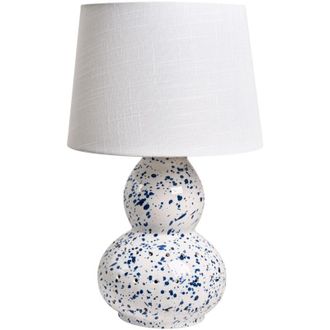 Beliani Lampada da tavolo moderna con base in ceramica e paralume in lino a forma di tamburo con spruzzi blu artistici e finitura bianca lucida Macal