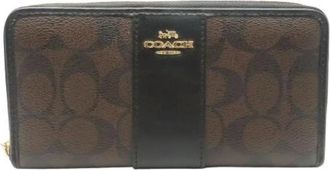 Coach Pre-owned Wallets, female, Brown, Size: ONE SIZE Pre-owned Plastic Wallet
