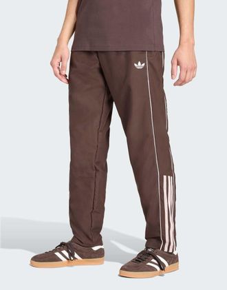 adidas Originals Pantaloni sportivi a mezze righe color caff&egrave; aurora-Marrone