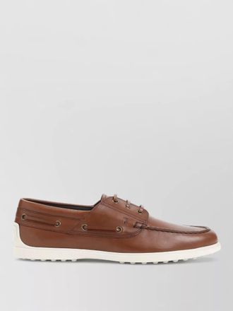 Tod's boat loafer contrast sole metal eyelets