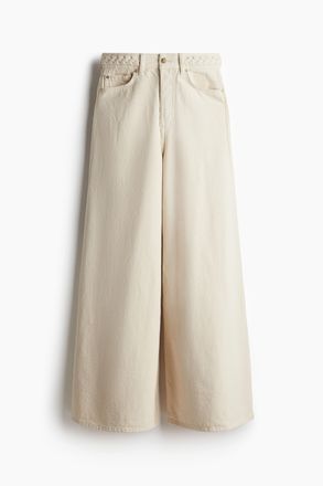 H&M Weite Jeans mit Flechtdetail - Hellbeige