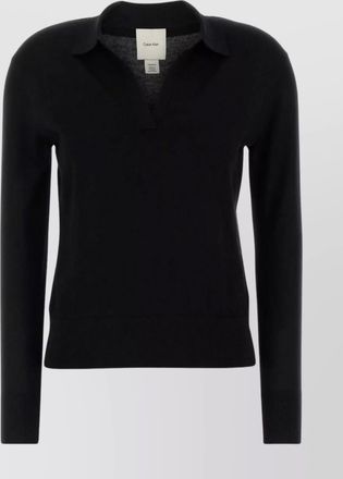 Calvin Klein polo shirt with collared design and long sleeves