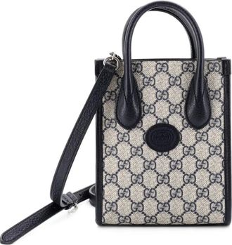 Gucci Borsa a tracolla GG mini in tela cerata con applicazione - Blu