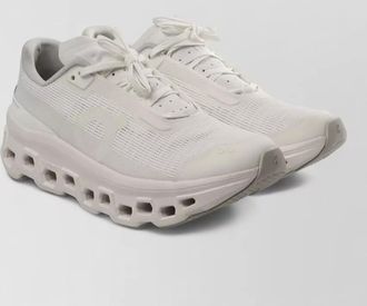 On perforated low-top sneakers