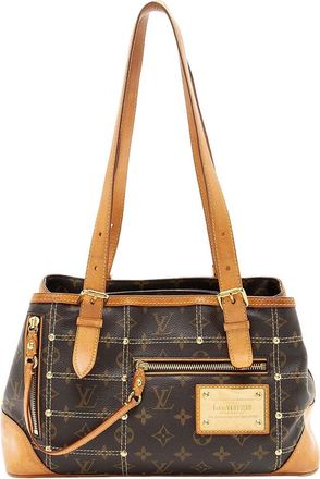 Louis Vuitton Brown Limited Edition Monogram Canvas Riveting (Authentic Pre- Loved)