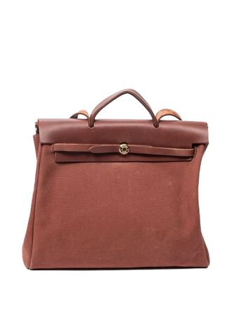 Herm&egrave;s leather-trimmed shoulder bag - women - Leather/Cotton - One Size - Brown