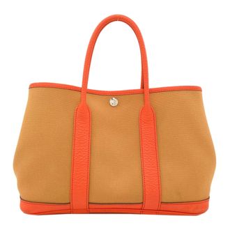 Herm&egrave;s Orange Negonda Leather Canvas Tote Bag (Pre-Owned)