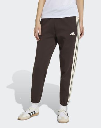 adidas Stadium - Pantaloni regular color caff&egrave; aurora con tre strisce-Marrone