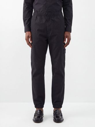 Stone Island Pantaloni jogging in flanella di lana con logo Compass