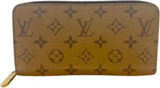 Louis Vuitton Pre-owned Monogram Reverse Long wallet - Dames - Vintage Accessoires - Bruin - ONE Size - Leer - Vintage