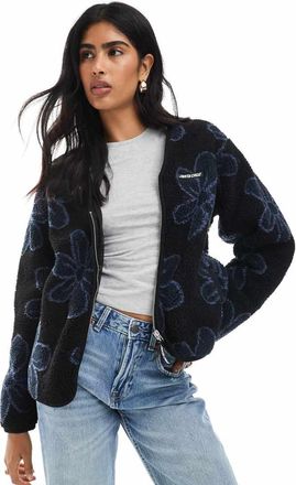 Santa Cruz Giacca comoda in pile borg nera con motivo con margherite con scollo a V e zip-Nero