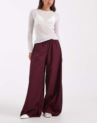 adidas Originals Firebird pantaloni della tuta intrecciati bordeaux-Rosso