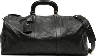 Chanel diamond-quilted two-way holdall bag - women - Calf Leather - One Size - Black