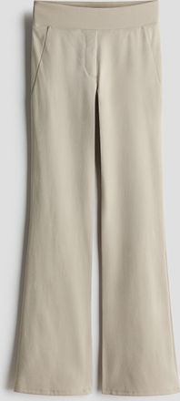 H&M Ausgestellte Hose mit Four-way-Stretch - Beige