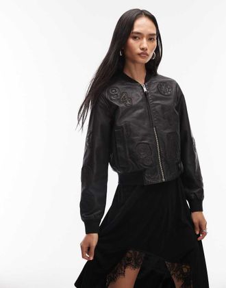 AllSaints Orten 94 - Bomber corto in pelle nero con toppe