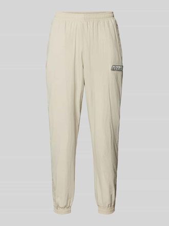 Karl Kani Sweatpants mit elastischem Bund in Sand, Gr&ouml;&szlig;e XL