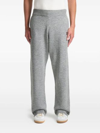 Mani&egrave;re De Voir signature embossed-patch knit track pants - Grey