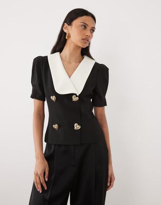 Sister Jane Sister Jane - Top nero oversize con bottoni a cuore e colletto a contrasto