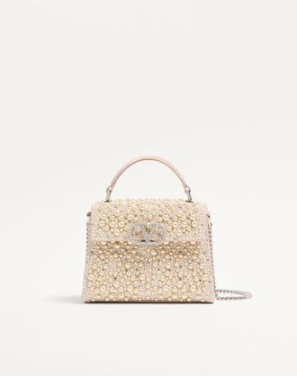 Valentino Garavani Valentino Garavani mini Vsling handbag with pearls, rhinestones and jewel logo Wo