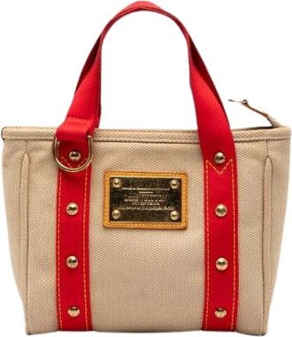 Louis Vuitton Pre-owned Mini Bags, female, Beige, Size: ONE SIZE Pre-owned Canvas Mini Bag