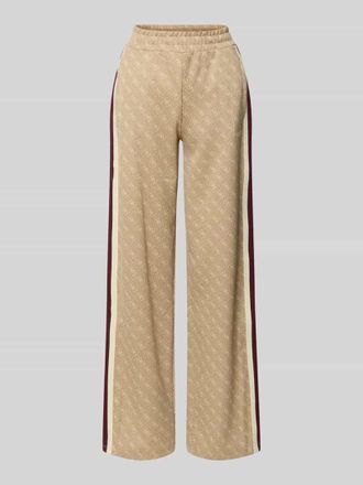 Guess Wide Fit Sweatpants mit Allover-Logo-Print Modell Jacquard in Camel, Gr&ouml;&szlig;e XL