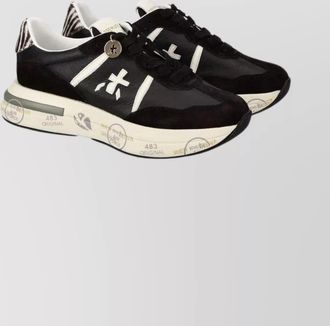 Premiata low-top sneakers with contrast sole and round toe