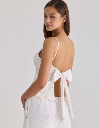 House of CB Nolia - Top in sangallo di cotone con fiocco sul retro bianco