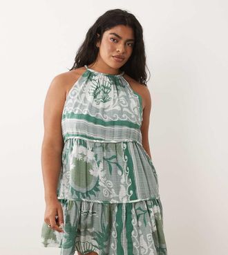 Asos Curve ASOS DESIGN Curve - Prendisole corto a balze allacciato al collo con bordi spessi blu con stampa mista-Multi
