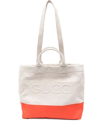 Gucci logo-embossed tote bag - women - Canvas - One Size - Neutrals