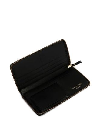 Comme Des Gar&ccedil;ons zip-around leather wallet - unisex - Calf Leather - One Size - Black