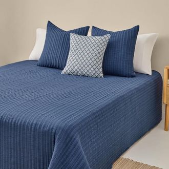 Textura Colcha bicolor acolchada color azul oscuro. Cama 150-160cm
