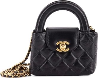 Chanel Borsa a tracolla Kelly nano in pelle di vitello trapuntata lucida con manico - Nero