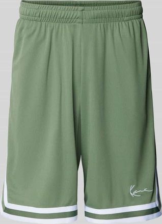 Karl Kani Baggy Fit Shorts mit Strukturmuster in Oliv, Gr&ouml;&szlig;e L