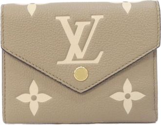 Louis Vuitton Monogram Empreinte Beige Tourterelle Leather Wallet (Bi-Fold) (Pre-Owned)