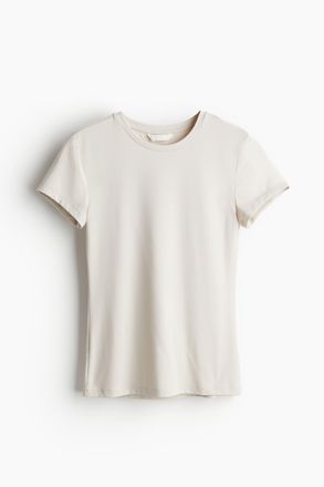 H&M Figurnahes T-Shirt aus Mikrofaser - Hellbeige