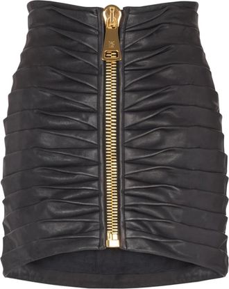 Balmain Korte geplooide rok van lamsvacht - Dames - Leren & Su&egrave;de rokken - Zwart - S - Katoen - Rokken