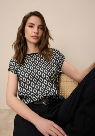 Tamaris Shirtbluse TAMARIS, Damen, Gr. 34, schwarz-weiss (schwarz sand), Satin, Obermaterial: 95% Viskose, 5% Elasthan. Vorderteil: 100% Polyester, bedruckt, 