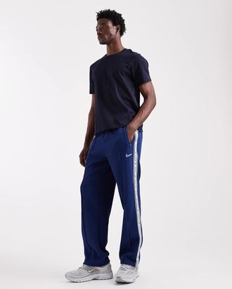 Nike Joggers affusolati color blu navy a righe