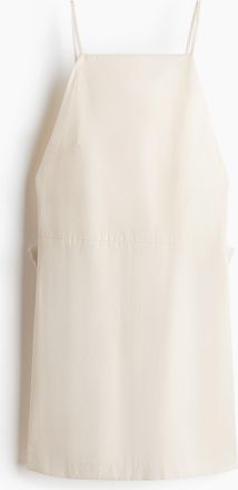 H&M Kleid mit tiefem R&uuml;ckenausschnitt und Schleife - Cremefarben