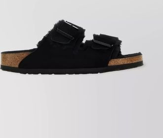 Birkenstock open toe flat sandals with fur texture and contrast