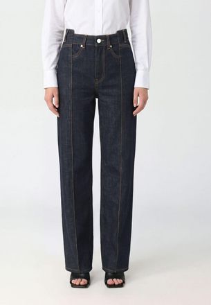 Ganni Jeans straight Fold in denim di cotone a vita alta con logo posteriore
