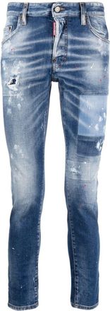 Dsquared2 paint-splatter distressed skinny jeans - men - Cotton/Elastane/Polyester/Cotton - 42 - Blue