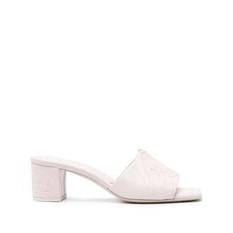 Alexander McQueen Alexander McQueen, Heeled Mules, female, Beige, Size: 7 1/2 US Beige Sandals with Seal Embellishment