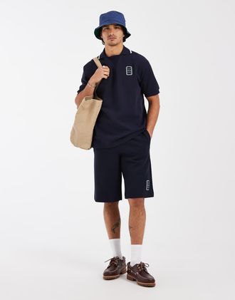Lacoste Polo a maniche corte ampia blu navy con logo in coordinato