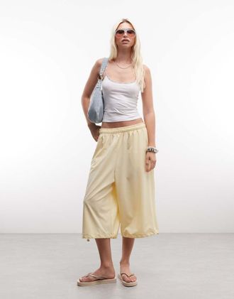 Collusion Pantaloni capri a tre quarti in nylon color latticello-Giallo