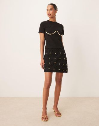 Never Fully Dressed Minigonna a portafoglio nera alluncinetto con conchiglie in coordinato-Nero