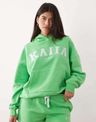 KAIIA Felpa con cappuccio verde acceso in misto cotone oversize con logo ricamato in coordinato