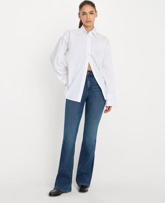 Good American Good Classic - Jeans bootcut tecnici morbidi lavaggio blu medio